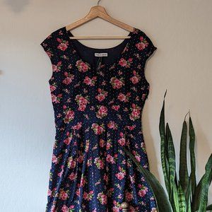 Silk Frock Shop Navy Polka-dot dress with rose print